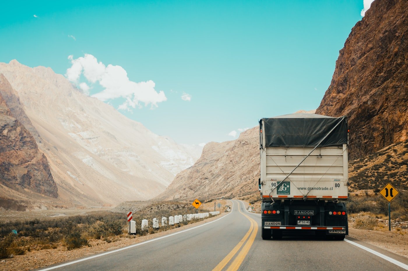 Delivery truck travelling along a highway